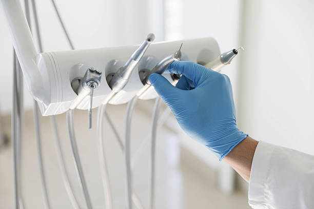 Professional Root Canal Treatment technician working in Lafayette, LA